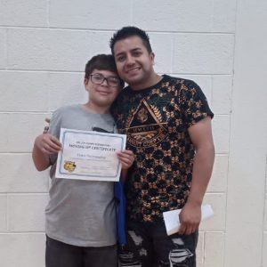 1. Story Martin Hernandez with his son